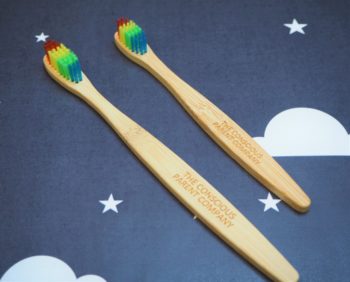 Adult eco toothbrush with rainbow bristles bright and colourful